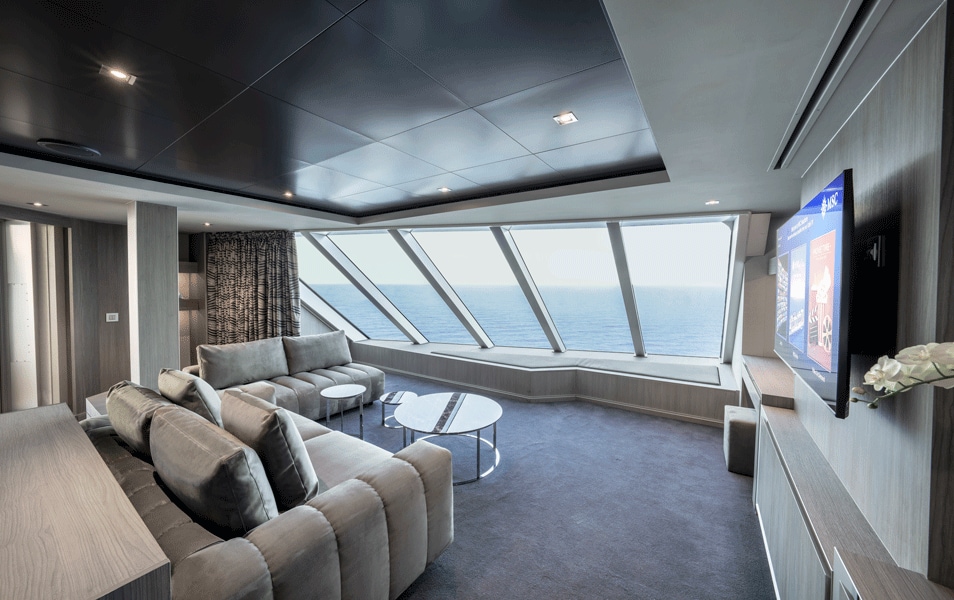 Luxury suite with panoramic ocean views and modern decor onboard | MSC Cruises Luxury suite with panoramic ocean views and modern decor onboard | MSC Cruises