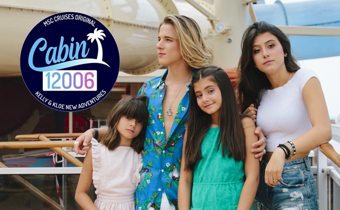 A family enjoying the deck with a Kelly & Kloe Cabin 12006 adventure sign | MSC Cruises A family enjoying the deck with a Kelly & Kloe Cabin 12006 adventure sign | MSC Cruises